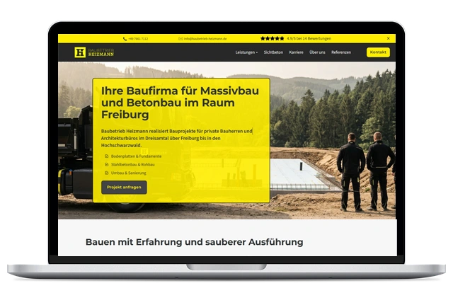 Website der Baufirma Heimann für Massiv- und Betonbau in Freiburg, dargestellt auf einem Laptop-Bildschirm.